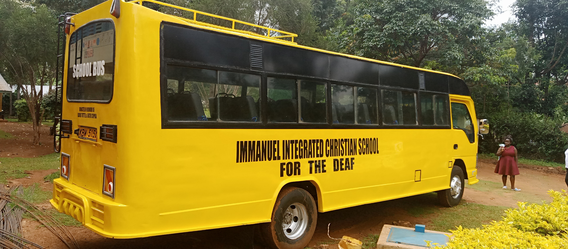 The yellow Immanuel Integrated Christian School for the Deaf bus