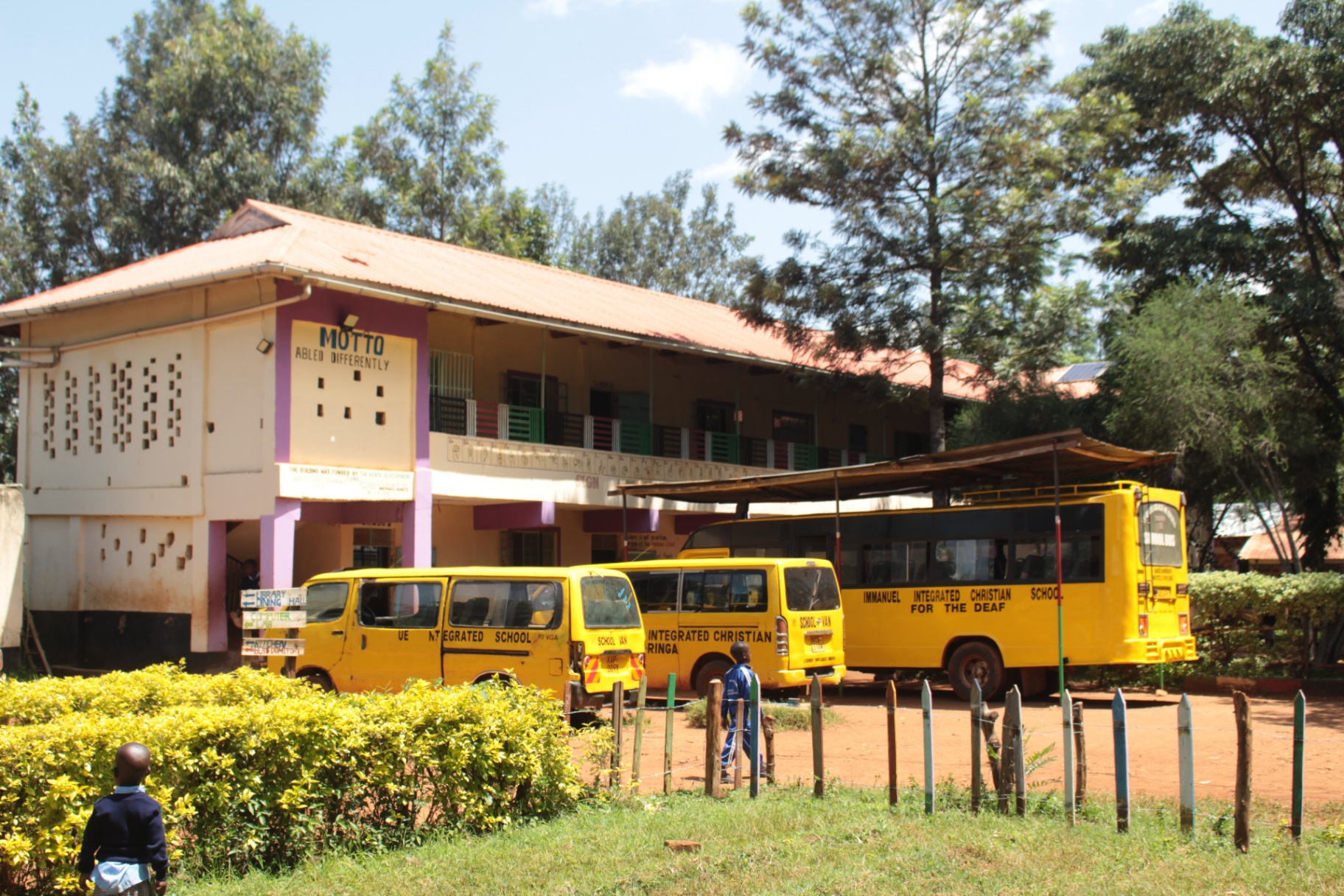 Teacher leading a lively classroom of deaf students